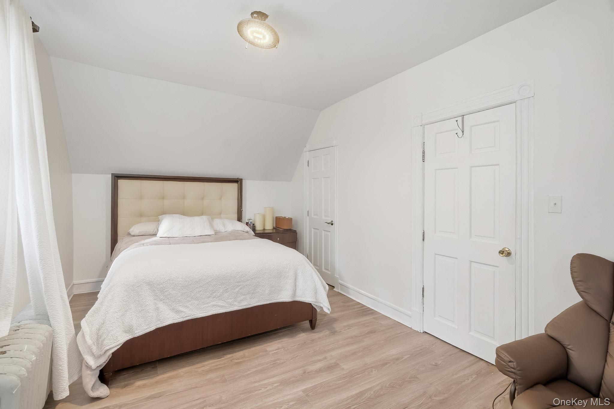 3340 Perry Avenue Bronx, NY 10467 - Photo 25 of 42 a bedroom with a bed and window