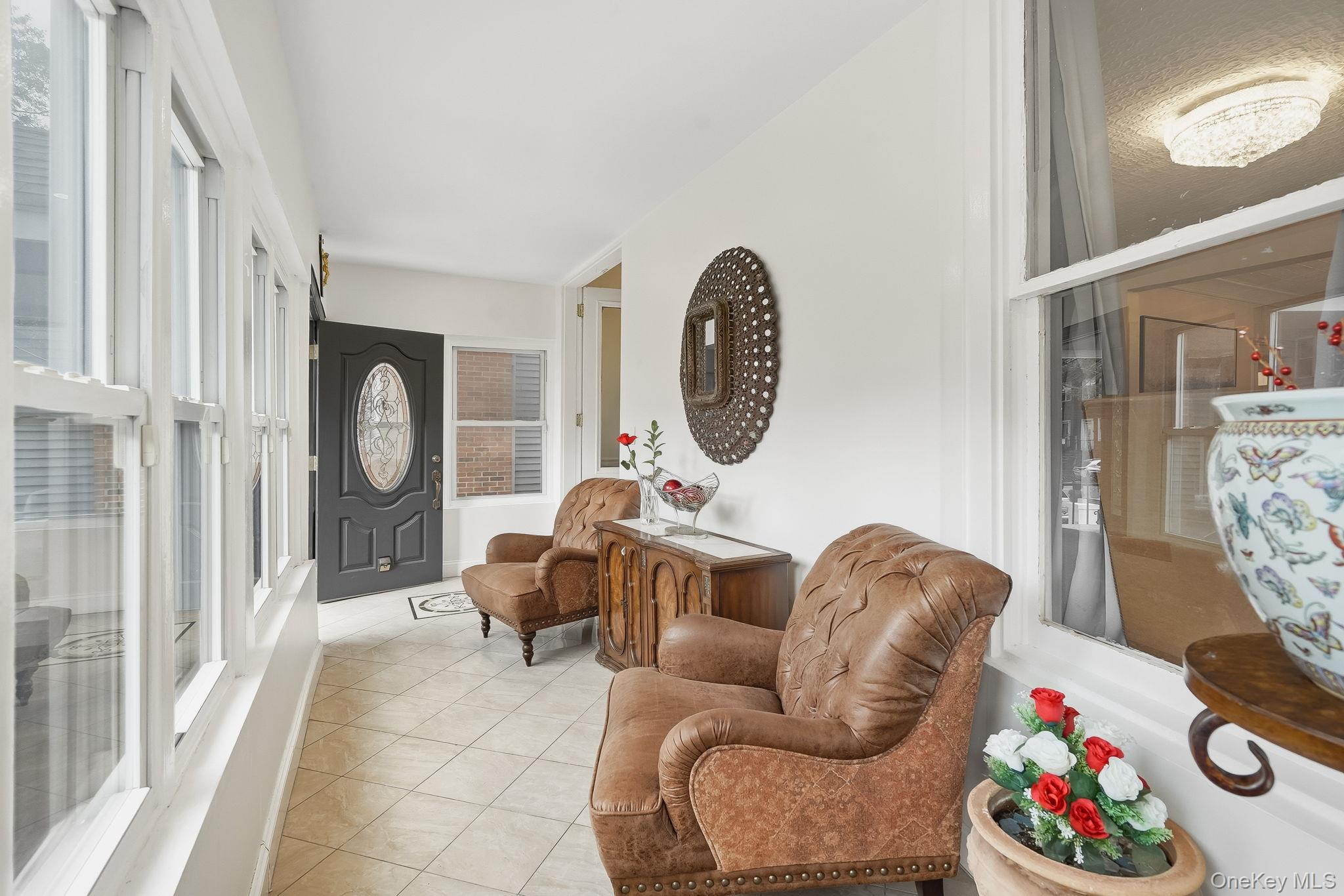 3340 Perry Avenue Bronx, NY 10467 - Photo 3 of 42 a living room with furniture and a large window