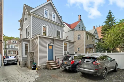 a car parked in front of a house