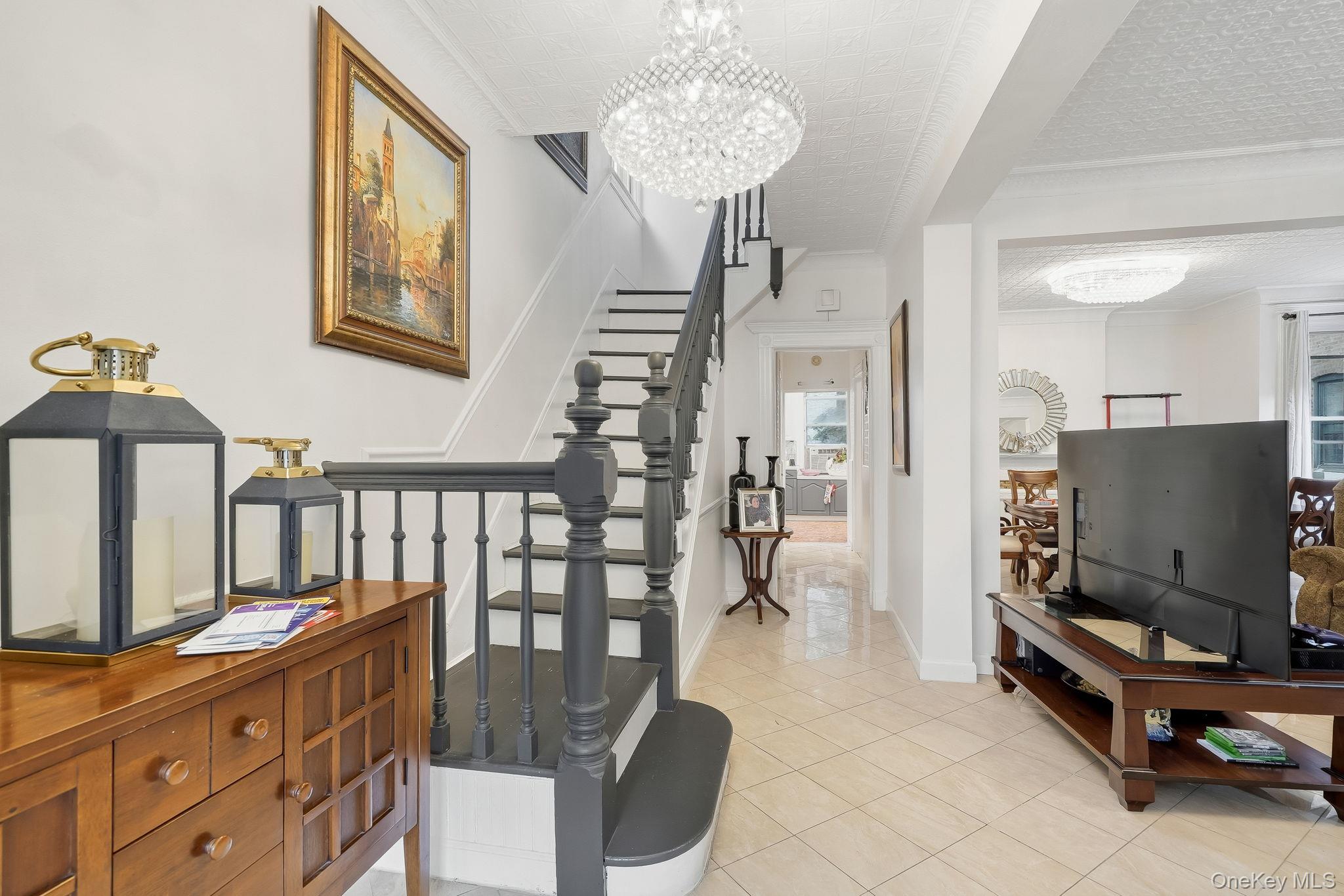 3340 Perry Avenue Bronx, NY 10467 - Photo 5 of 42 a living room with furniture and a flat screen tv