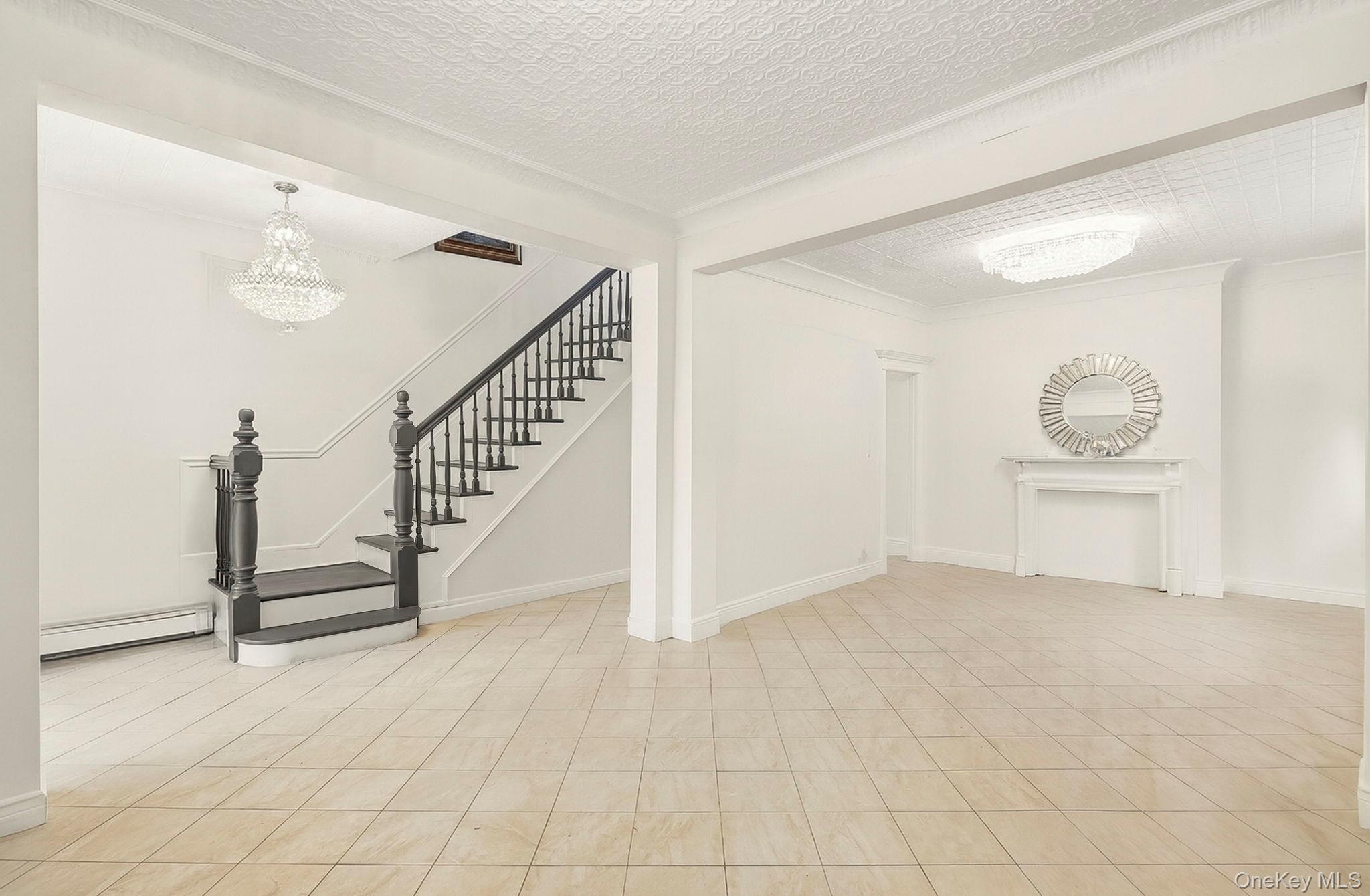 3340 Perry Avenue Bronx, NY 10467 - Photo 7 of 42 a view of an empty room with wooden floor