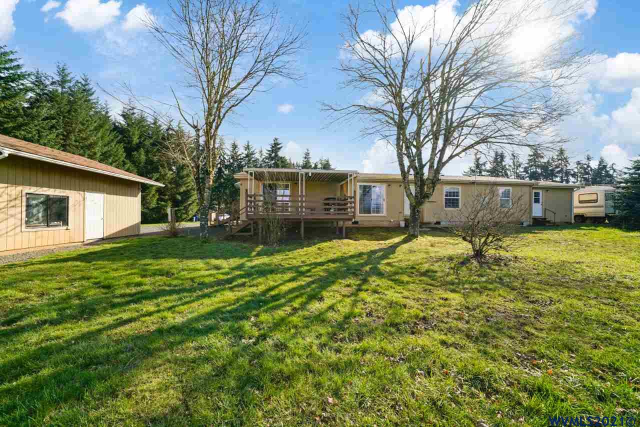 153 Hylo Road Southeast Salem, OR 97306 - Photo 34 of 41 a view of a house with a yard