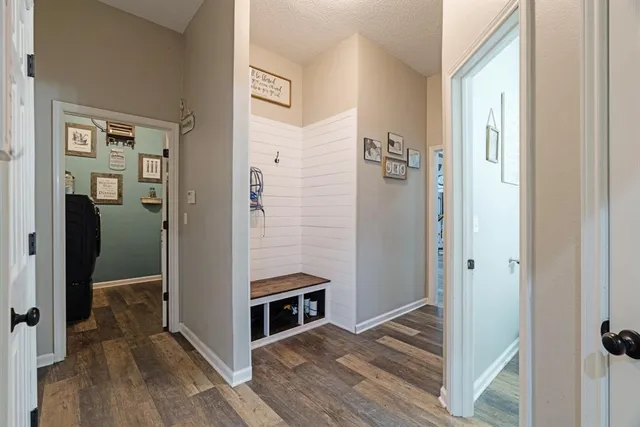 a view of bathroom with a sink and mirror