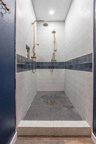 a view of a livingroom with furniture and a rug