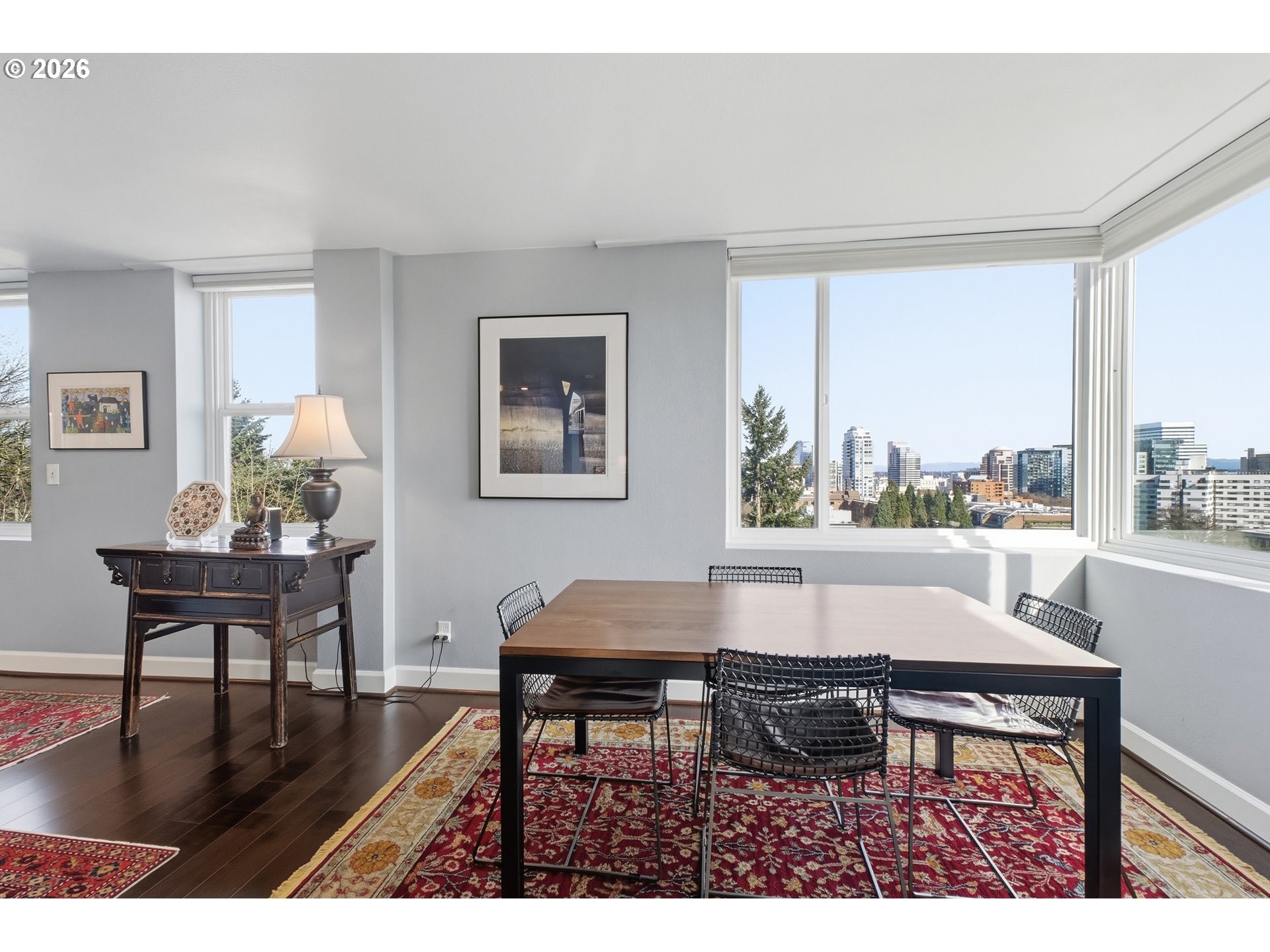 1205 Southwest Cardinell Drive, Unit 702 Portland, OR 97201 - Photo 13 of 17 a living room with furniture and a window