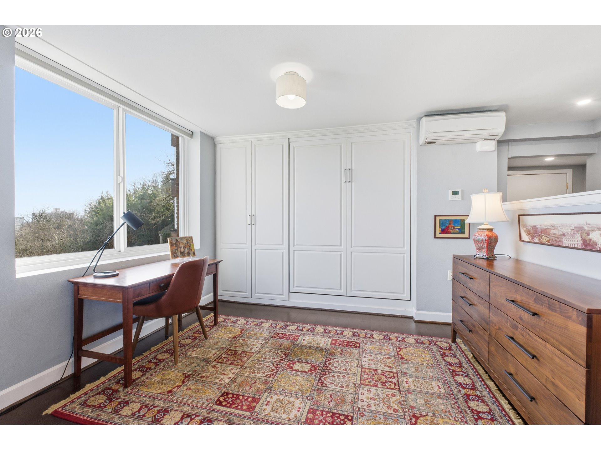 1205 Southwest Cardinell Drive, Unit 702 Portland, OR 97201 - Photo 4 of 17 a workspace with furniture and window