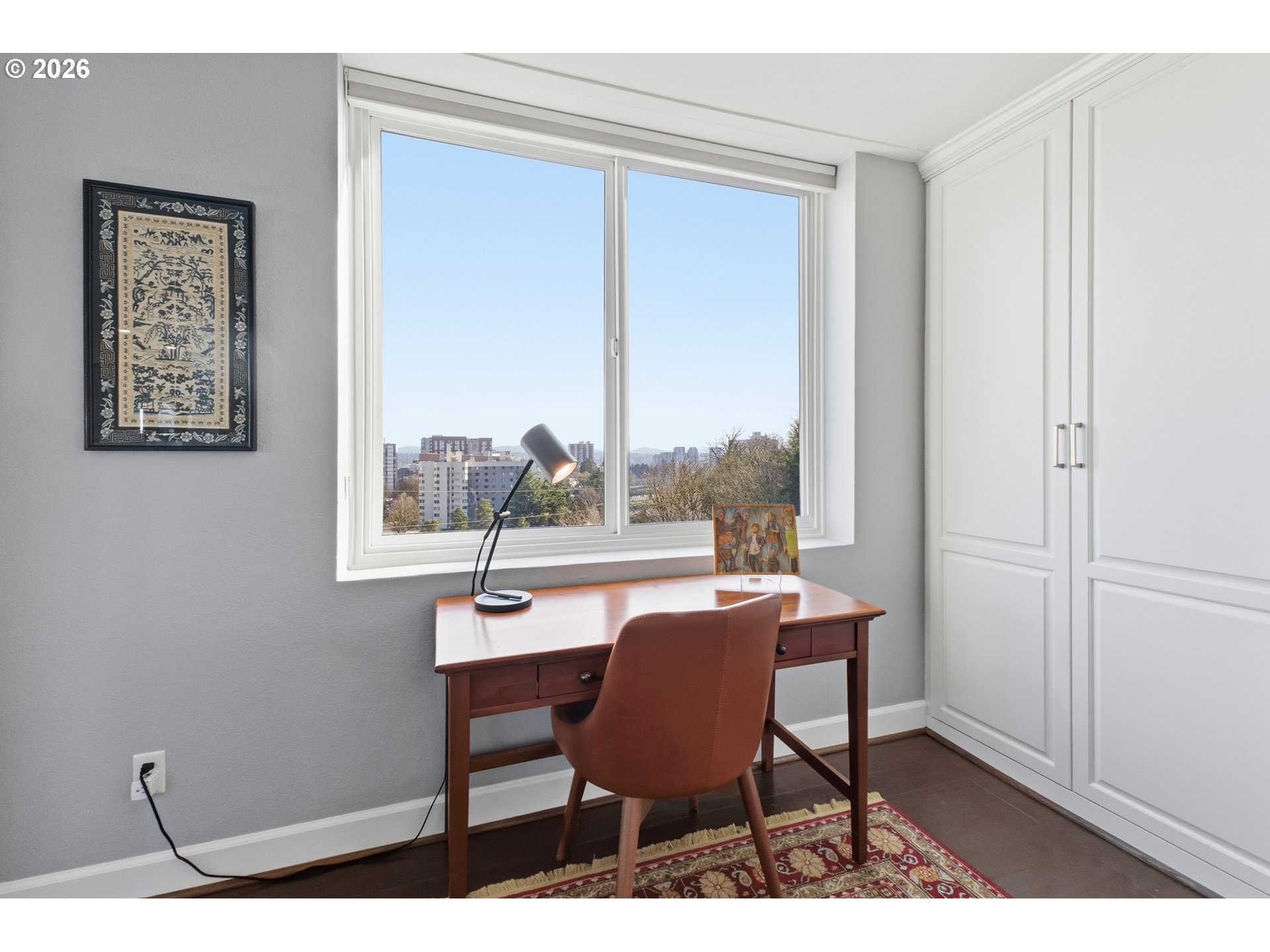 1205 Southwest Cardinell Drive, Unit 702 Portland, OR 97201 - Photo 6 of 17 a workspace with furniture and a window