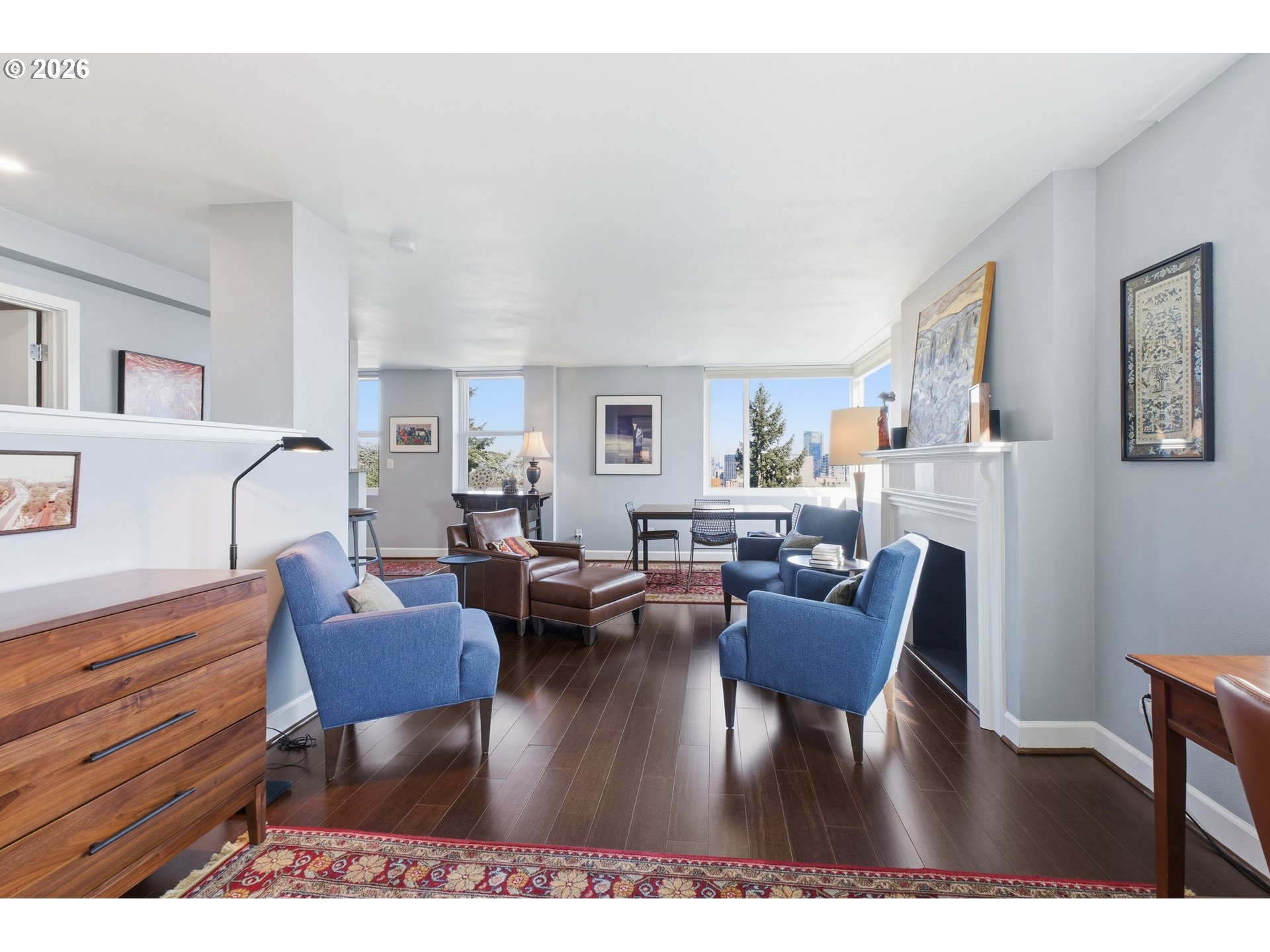 1205 Southwest Cardinell Drive, Unit 702 Portland, OR 97201 - Photo 8 of 17 a living room with furniture and a couch