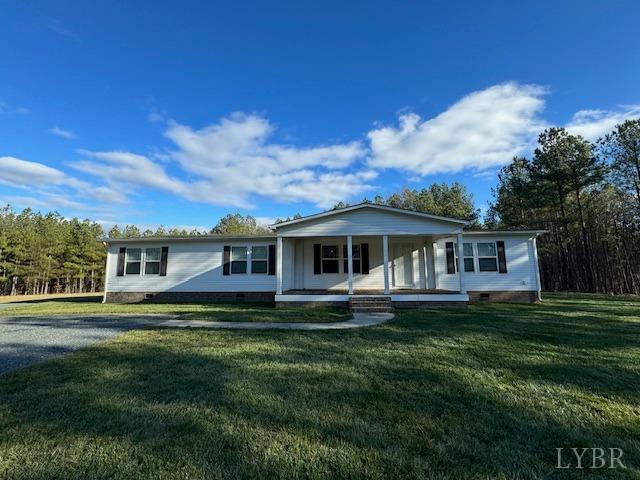 6098 Promise Land Road Appomattox, VA 24522 - Photo 1 of 35 a front view of a house with a garden