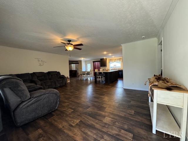 6098 Promise Land Road Appomattox, VA 24522 - Photo 12 of 35 a living room with furniture and a wooden floor