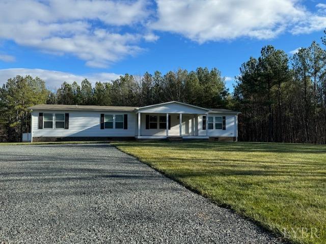 6098 Promise Land Road Appomattox, VA 24522 - Photo 2 of 35 a front view of a house with a garden