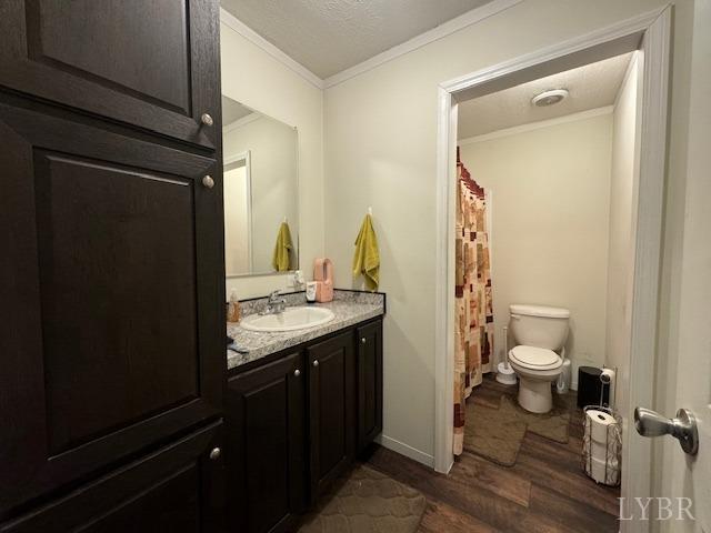6098 Promise Land Road Appomattox, VA 24522 - Photo 26 of 35 a bathroom with a granite countertop sink toilet and shower