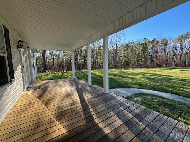 6098 Promise Land Road Appomattox, VA 24522 - Photo 4 of 35 a view of a backyard with table and chairs