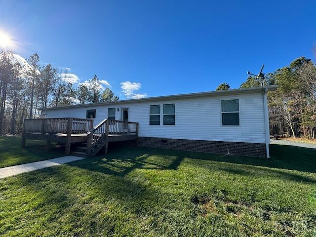 6098 Promise Land Road Appomattox, VA 24522 - Photo 5 of 35 a front view of a house with garden