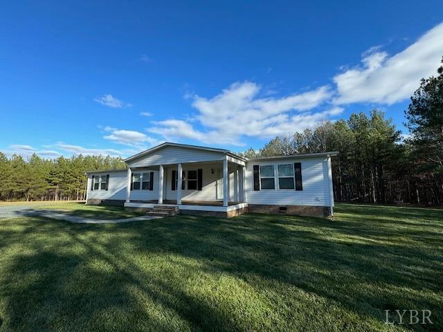 6098 Promise Land Road Appomattox, VA 24522 - Photo 6 of 35 a front view of a house with a garden