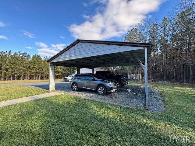 6098 Promise Land Road Appomattox, VA 24522 - Photo 7 of 35 a view of a car parked in the yard