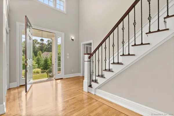 a living room with kitchen furniture and a window