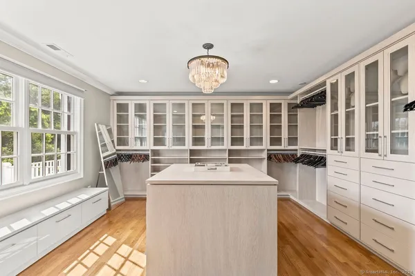 a kitchen with stainless steel appliances granite countertop a stove oven and a refrigerator