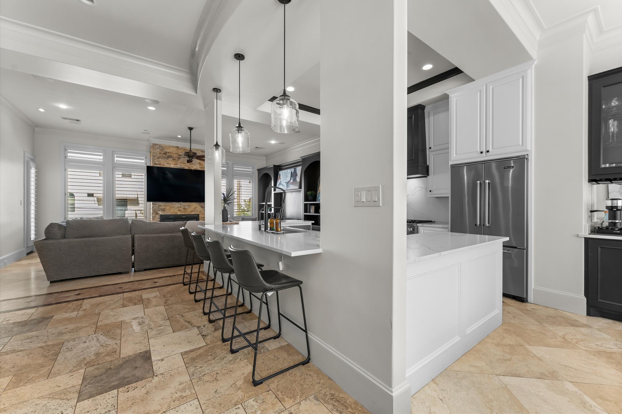 5215 Feagan Street, Unit A Houston, TX 77007 - Photo 11 of 35 a view of kitchen with kitchen island refrigerator stove microwave and cabinets