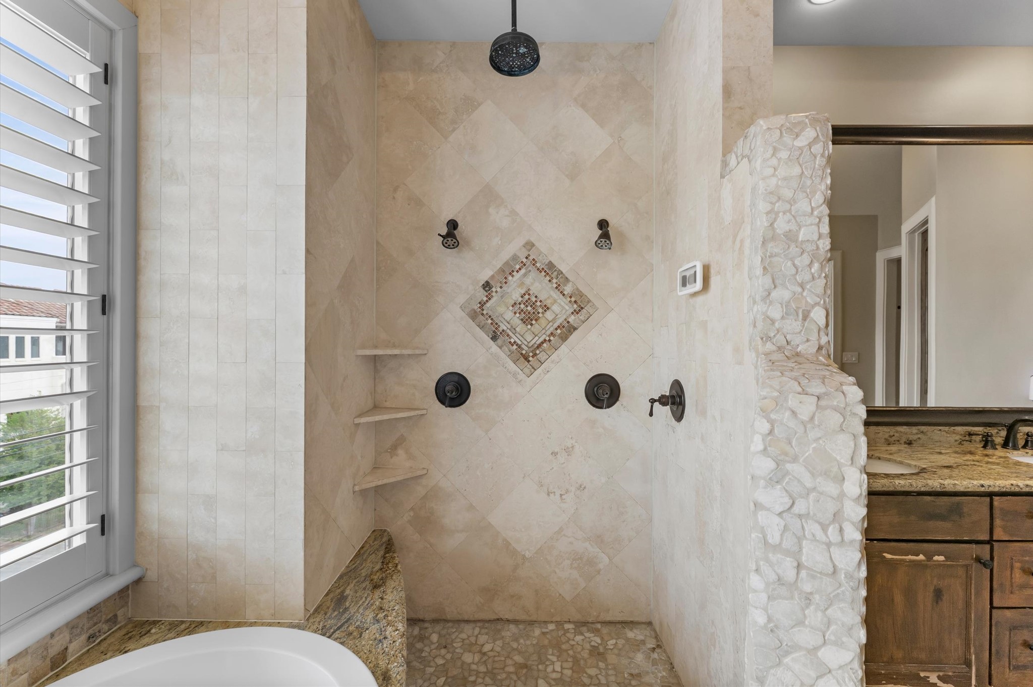 5215 Feagan Street, Unit A Houston, TX 77007 - Photo 21 of 35 a bathroom with a sink and mirror