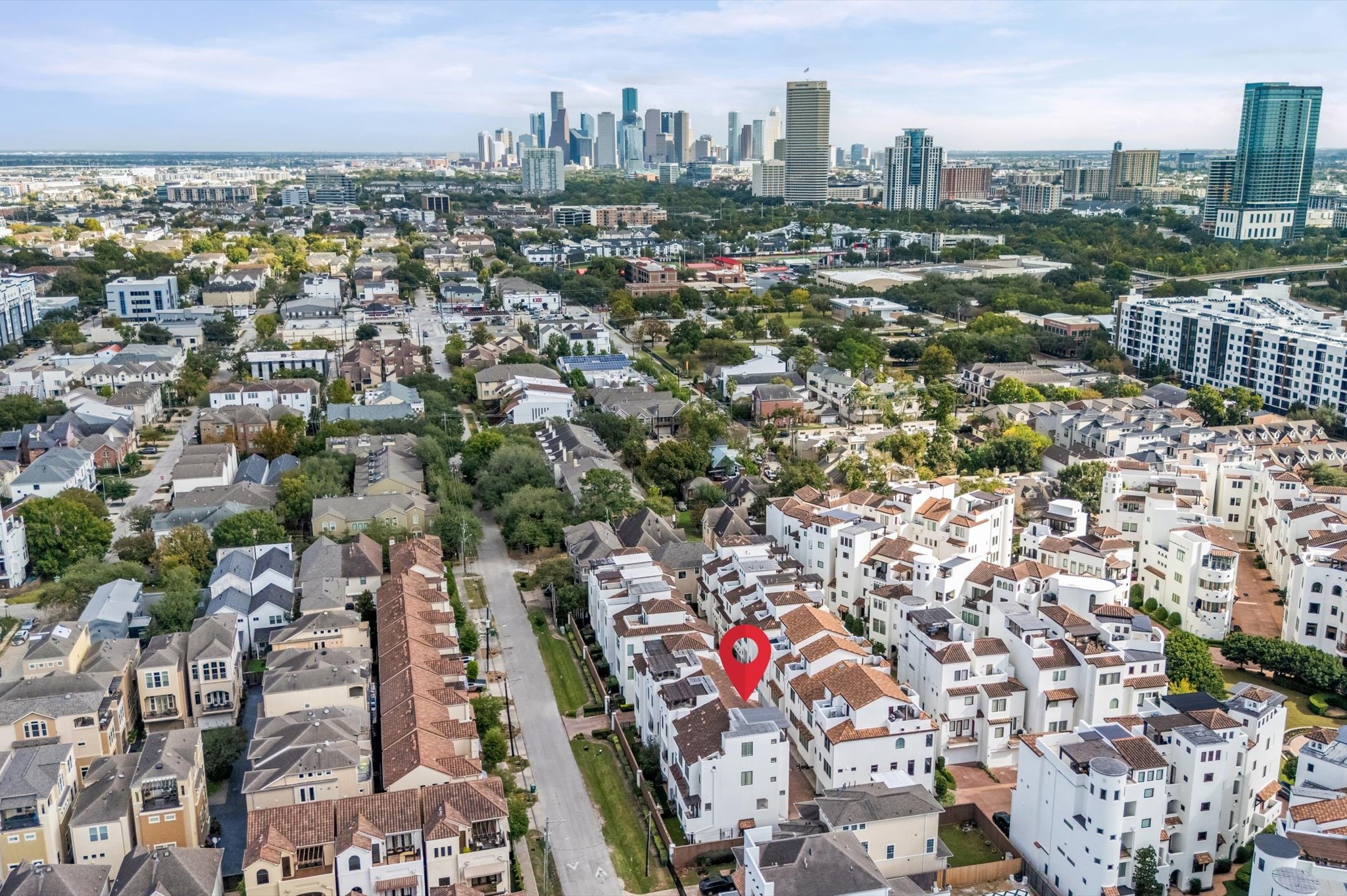 5215 Feagan Street, Unit A Houston, TX 77007 - Photo 34 of 35 an aerial view of a city with lots of residential buildings