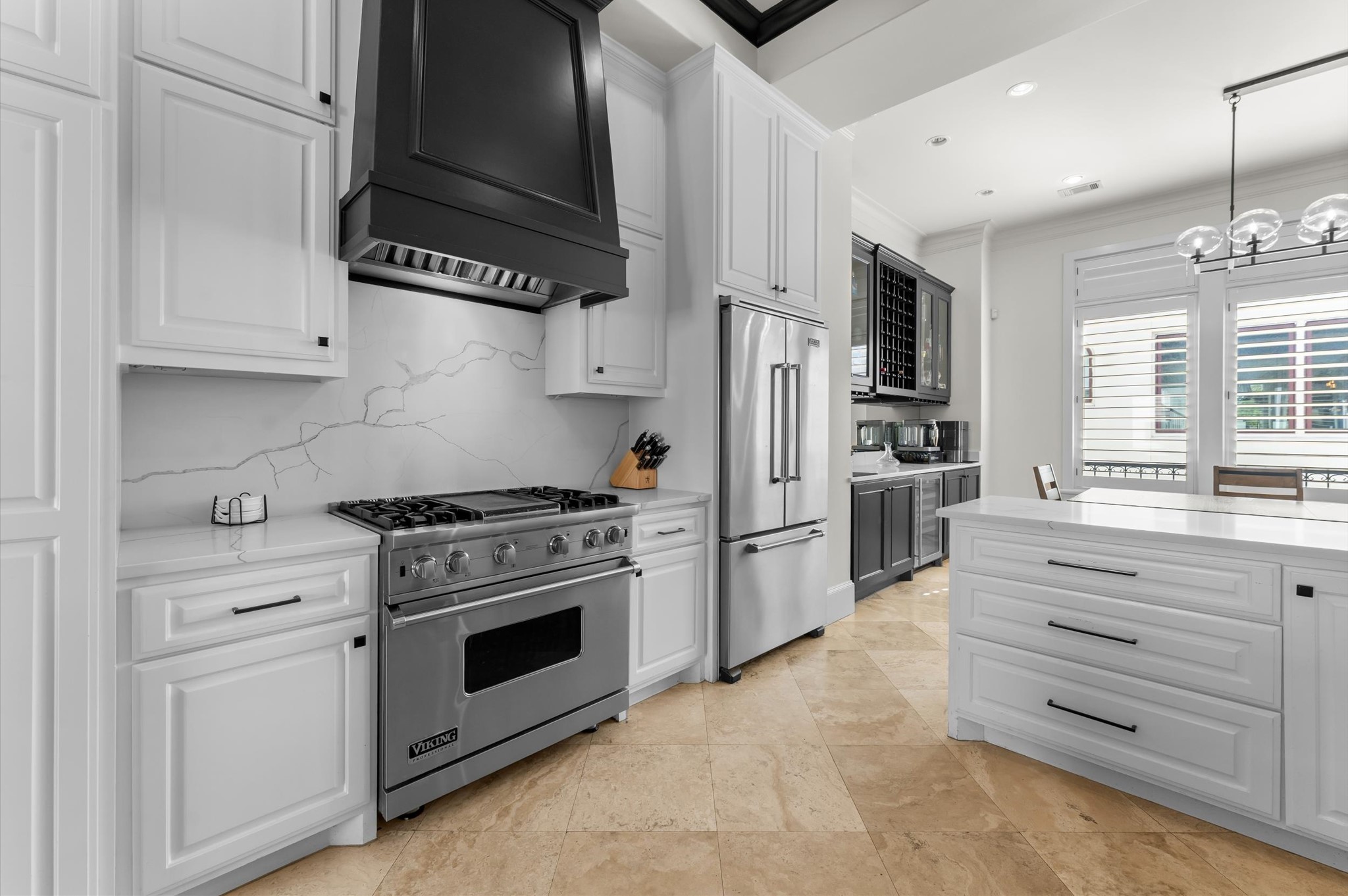 5215 Feagan Street, Unit A Houston, TX 77007 - Photo 7 of 35 a kitchen with granite countertop cabinets and steel stainless steel appliances