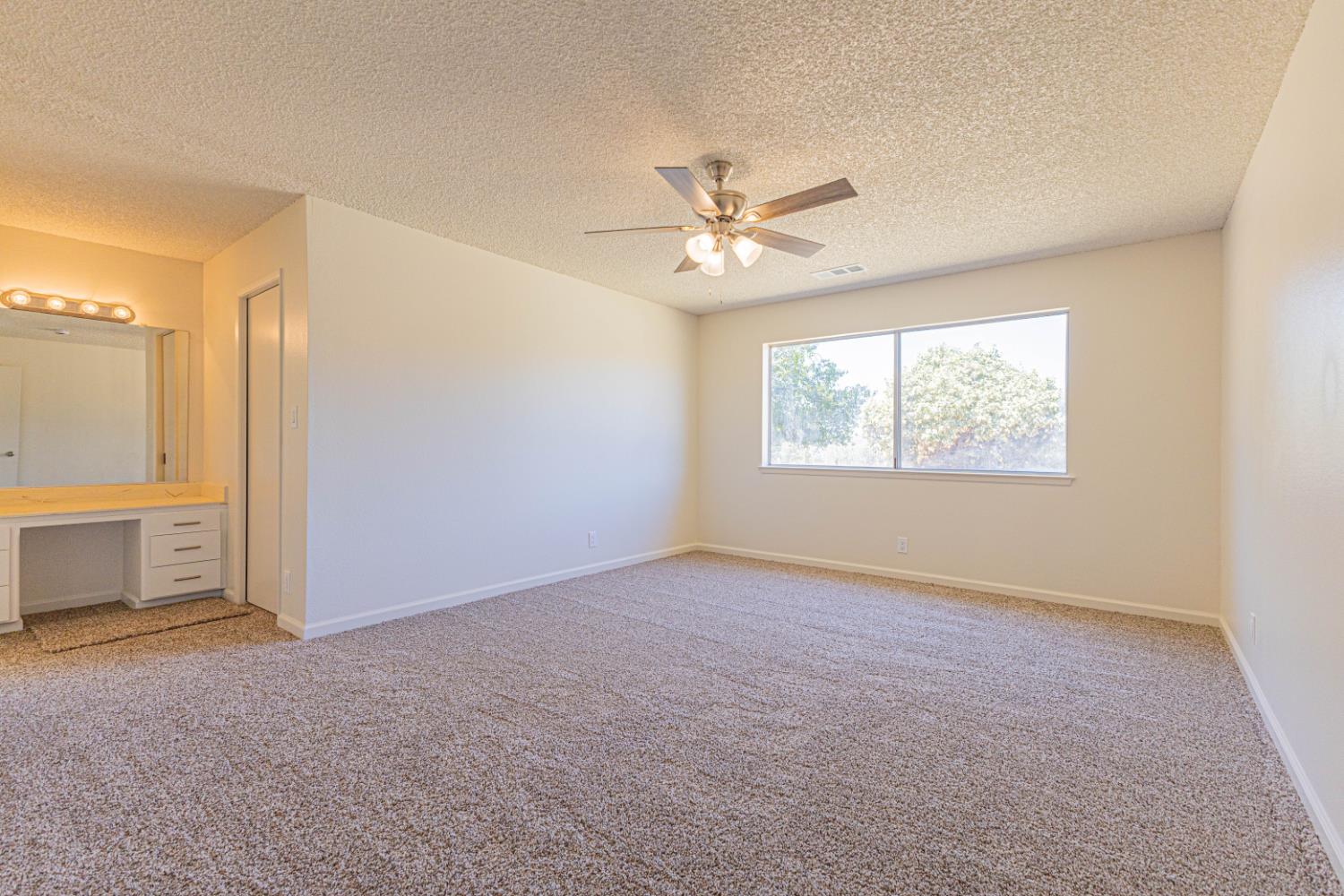 31612 Duke Road North Fork, CA 93643 - Photo 22 of 44 a view of an empty room with a window