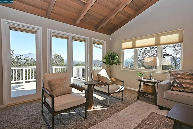 a kitchen with stainless steel appliances granite countertop a sink and a refrigerator