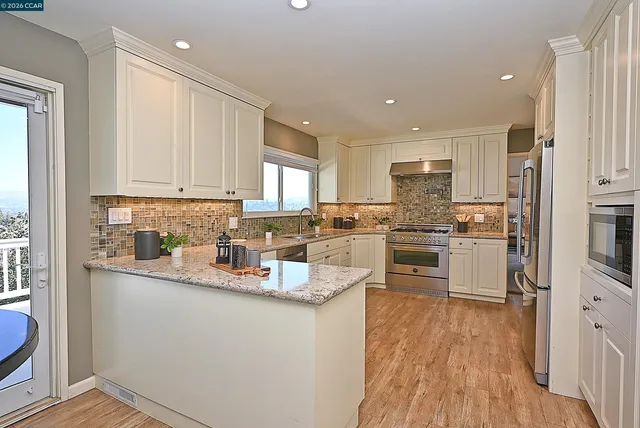 a kitchen sink sitting next to a window