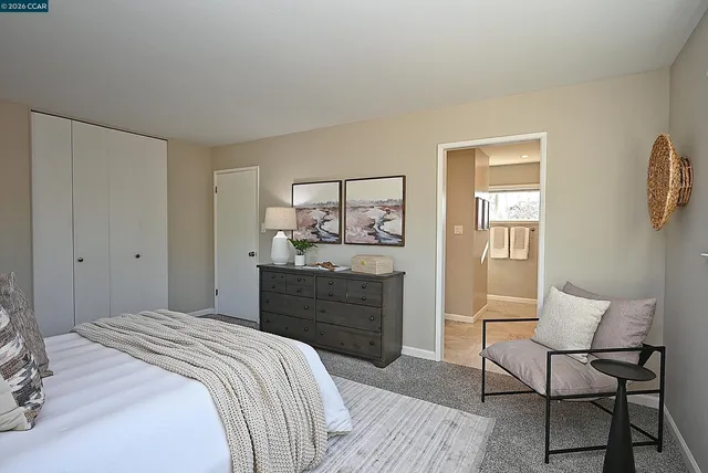 a workspace with furniture window and wooden floor