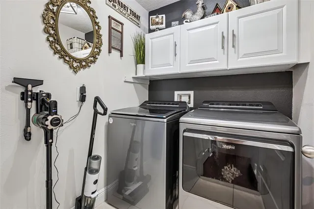 a bedroom with a bed and a desk