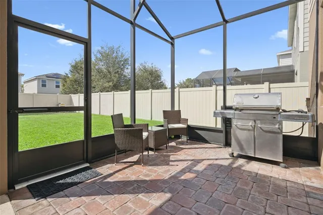 a view of a house with backyard