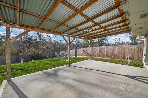 a view of backyard with green space