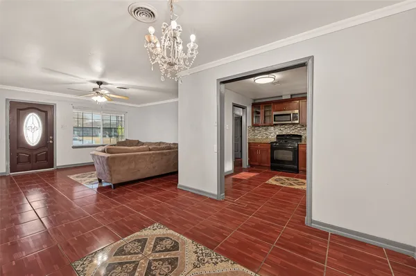 a view of livingroom with furniture and chandelier