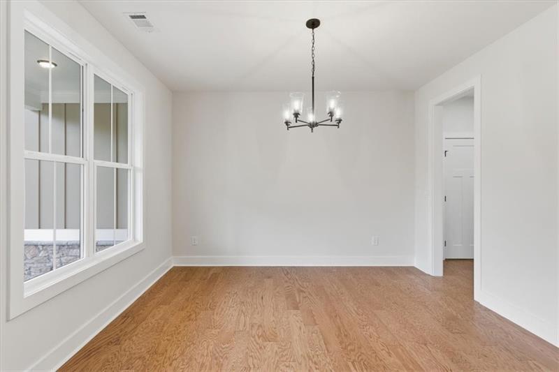 9 Everwood Court Rome, GA 30161 - Photo 17 of 44 a view of empty room with windows