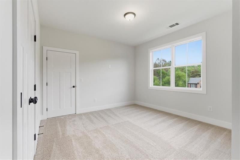 9 Everwood Court Rome, GA 30161 - Photo 27 of 44 a view of an empty room with a window