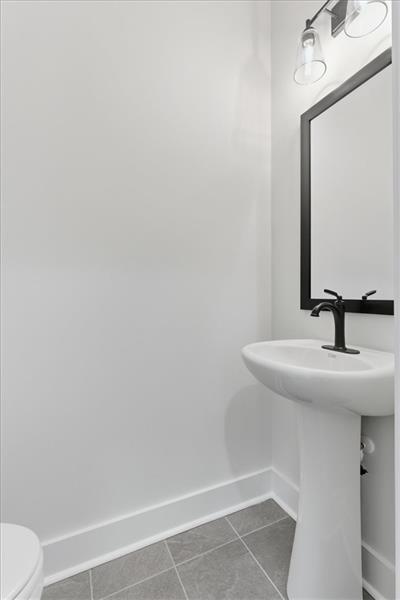 9 Everwood Court Rome, GA 30161 - Photo 32 of 44 a bathroom with a sink and a mirror