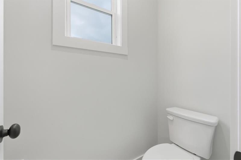 9 Everwood Court Rome, GA 30161 - Photo 34 of 44 a white toilet sitting next to a window