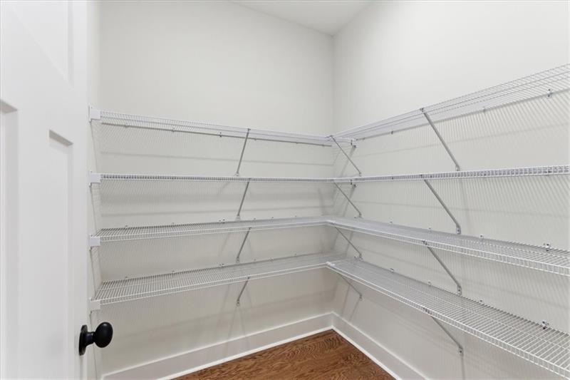 9 Everwood Court Rome, GA 30161 - Photo 36 of 44 a view of walk in closet with empty racks