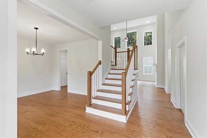 9 Everwood Court Rome, GA 30161 - Photo 5 of 44 a view of a hallway with wooden floor and staircase