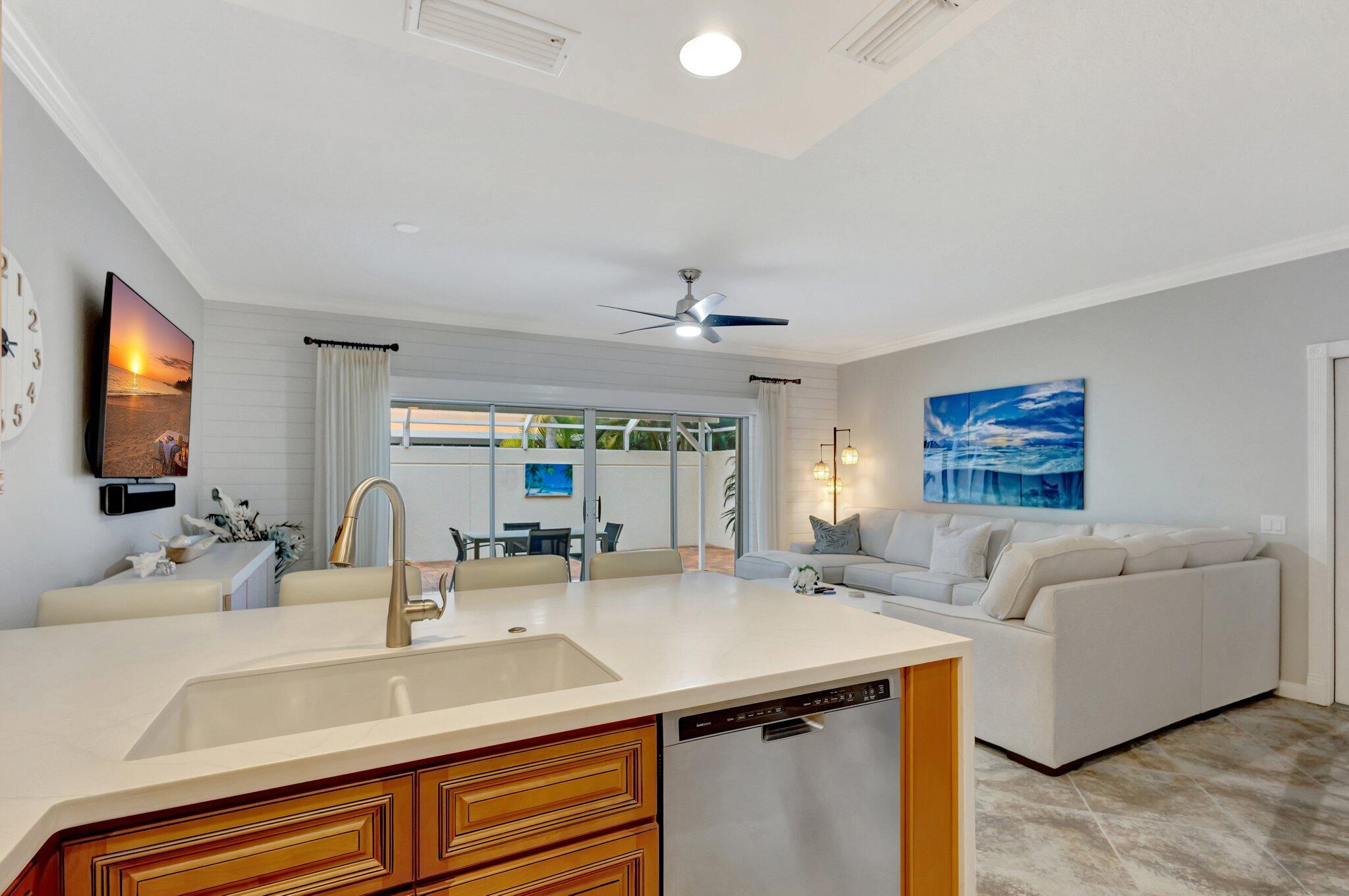 39 Laurel Oaks Circle Tequesta, FL 33469 - Photo 12 of 47 a bathroom with a double vanity sink and a mirror
