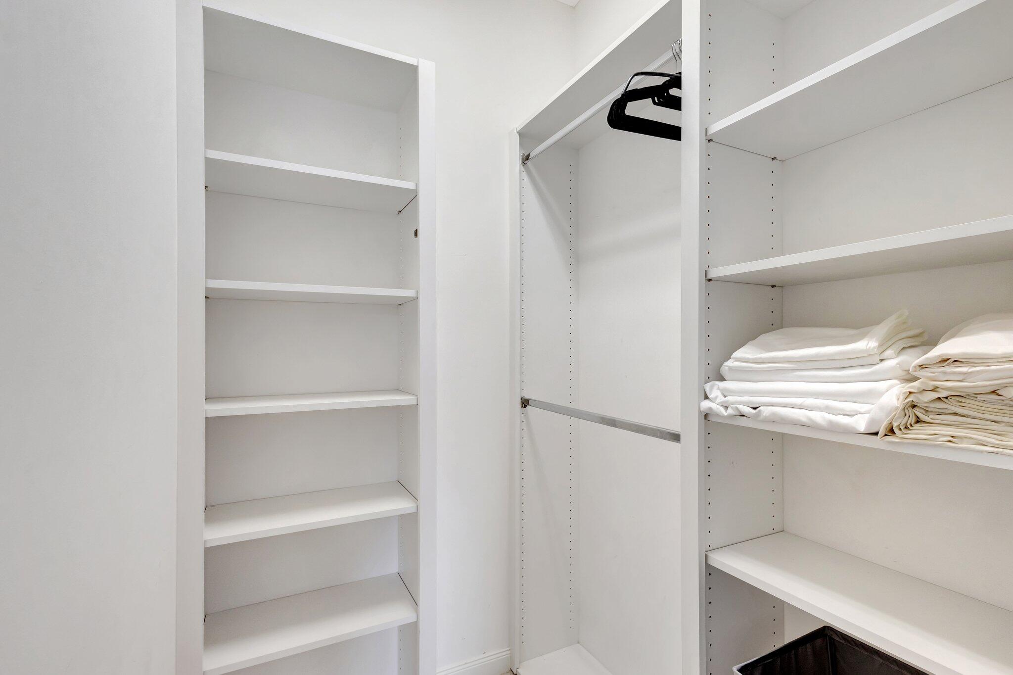 39 Laurel Oaks Circle Tequesta, FL 33469 - Photo 31 of 47 a view of walk in closet with empty racks