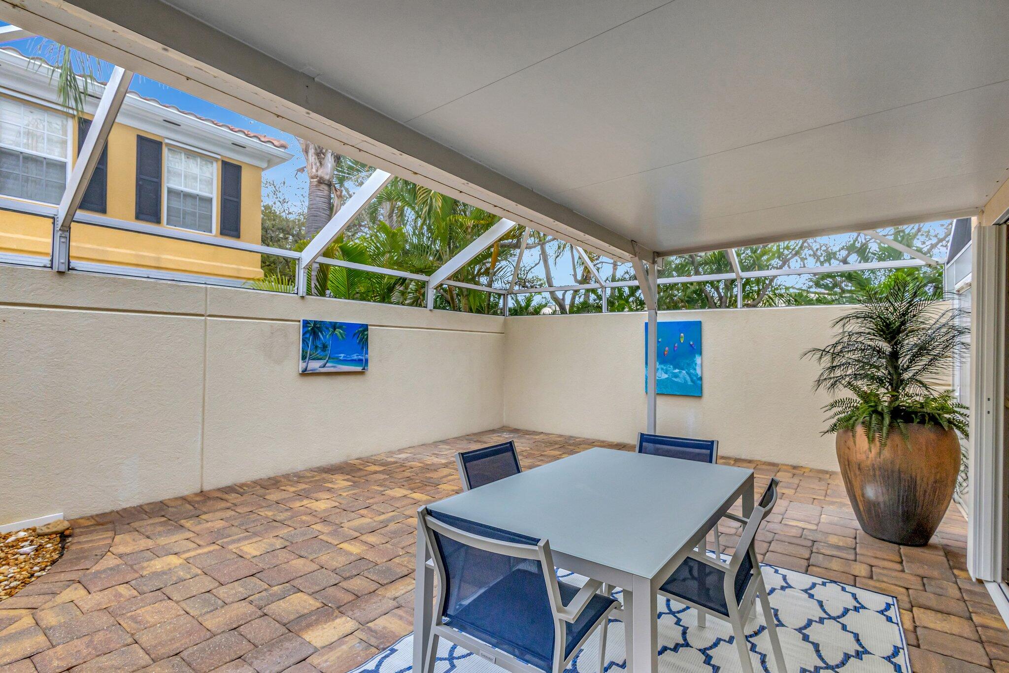39 Laurel Oaks Circle Tequesta, FL 33469 - Photo 37 of 47 a view of an outdoor space with seating area