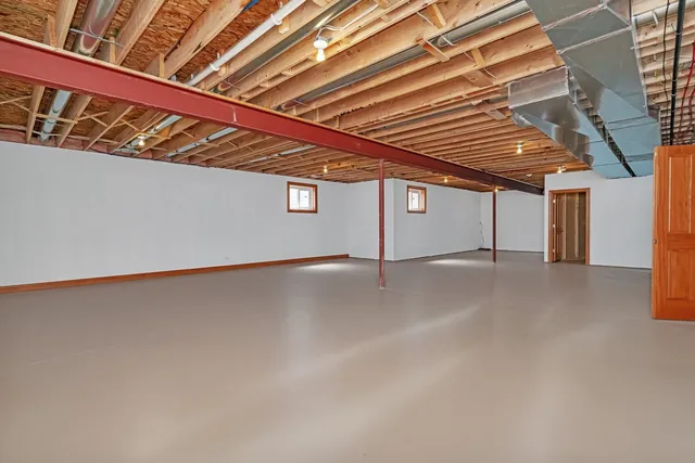 a view of a room with wooden roof