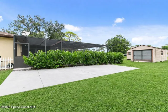 a house view with a garden space