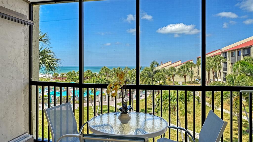 6234 Midnight Pass Road, Unit 307 Sarasota, FL 34242 - Photo 15 of 61 a view of a balcony with furniture
