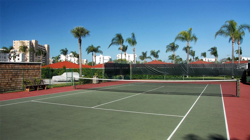 6234 Midnight Pass Road, Unit 307 Sarasota, FL 34242 - Photo 60 of 61 a view of a tennis court