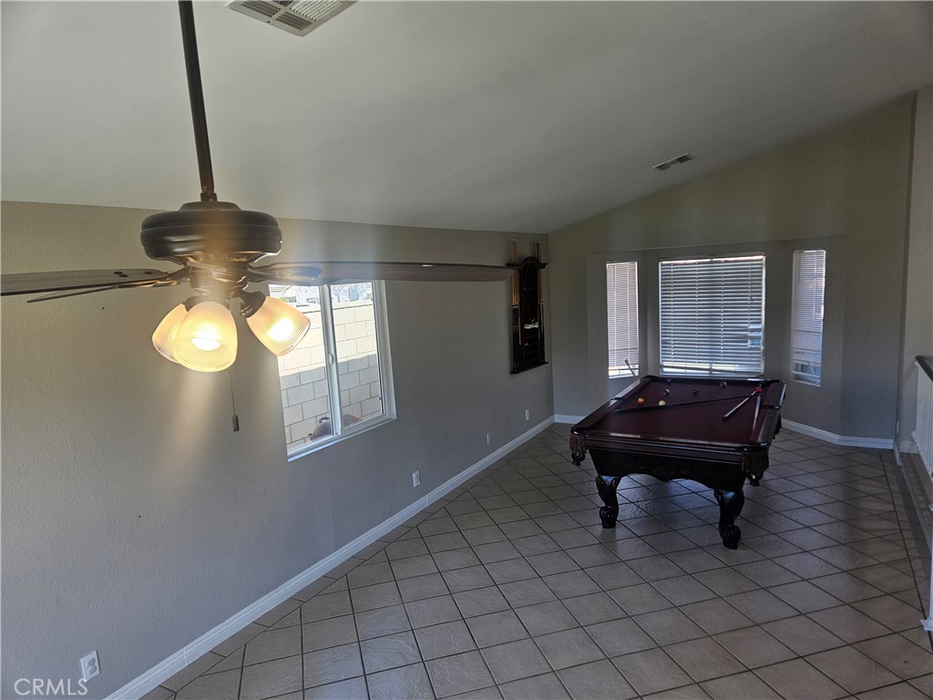 37323 Daybreak Street Palmdale, CA 93550 - Photo 21 of 58 a living room with furniture and a window