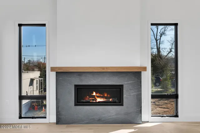 a living room with a fireplace