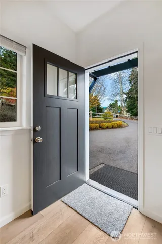 a view of empty room with windows